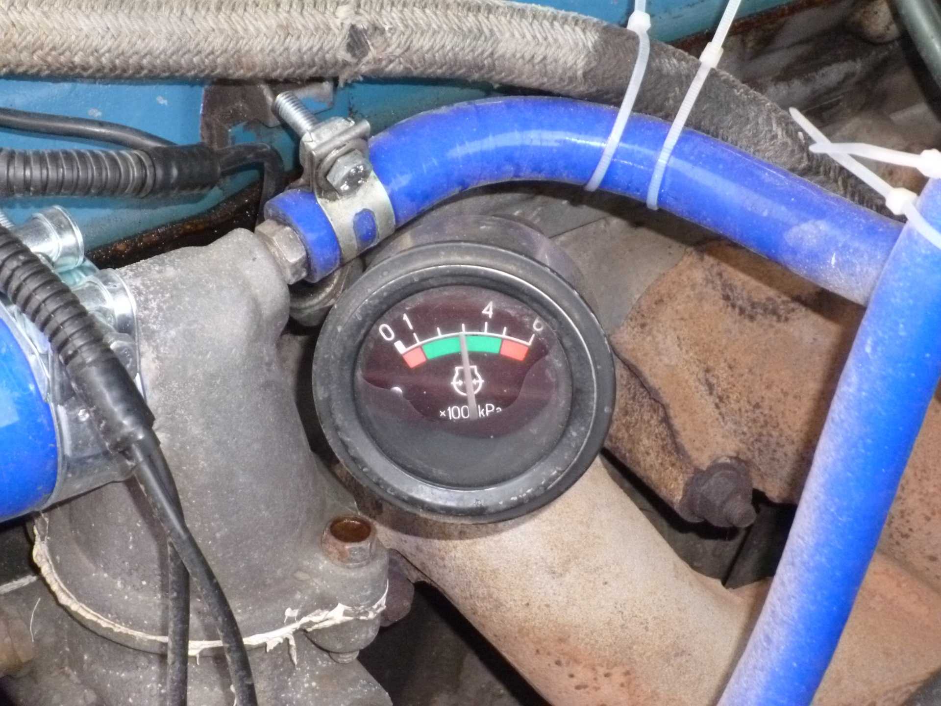 Как проверить идут ли газы в систему охлаждения двигателя